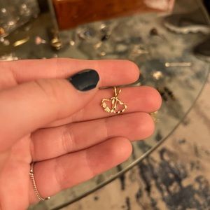 Double heart. 10k gold pendant